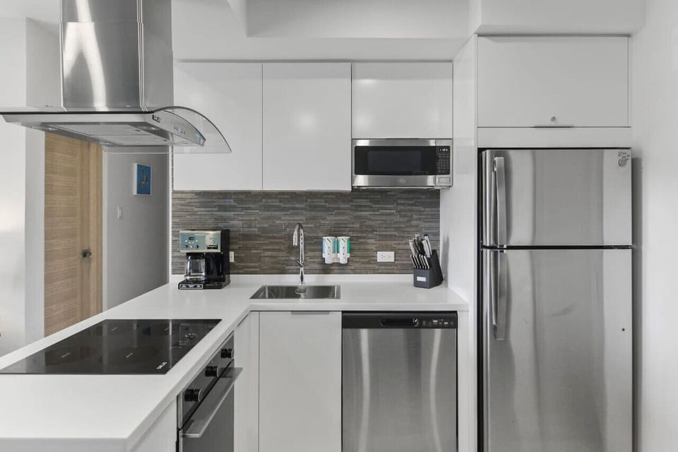 Step into the heart of culinary inspiration with our exquisite kitchen. This captivating space seamlessly combines modern elegance with functionality, creating an atmosphere where cooking becomes a delightful experience.