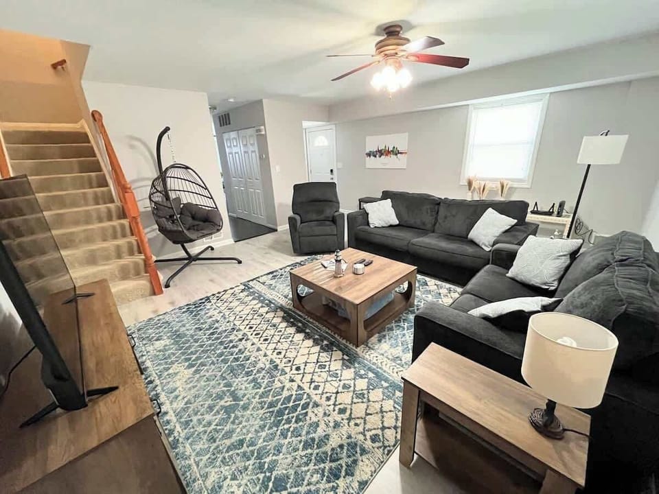 This spacious living room comes complete with plenty of seating and natural light. So you can watch your favorite show or just enjoy some relaxation. 