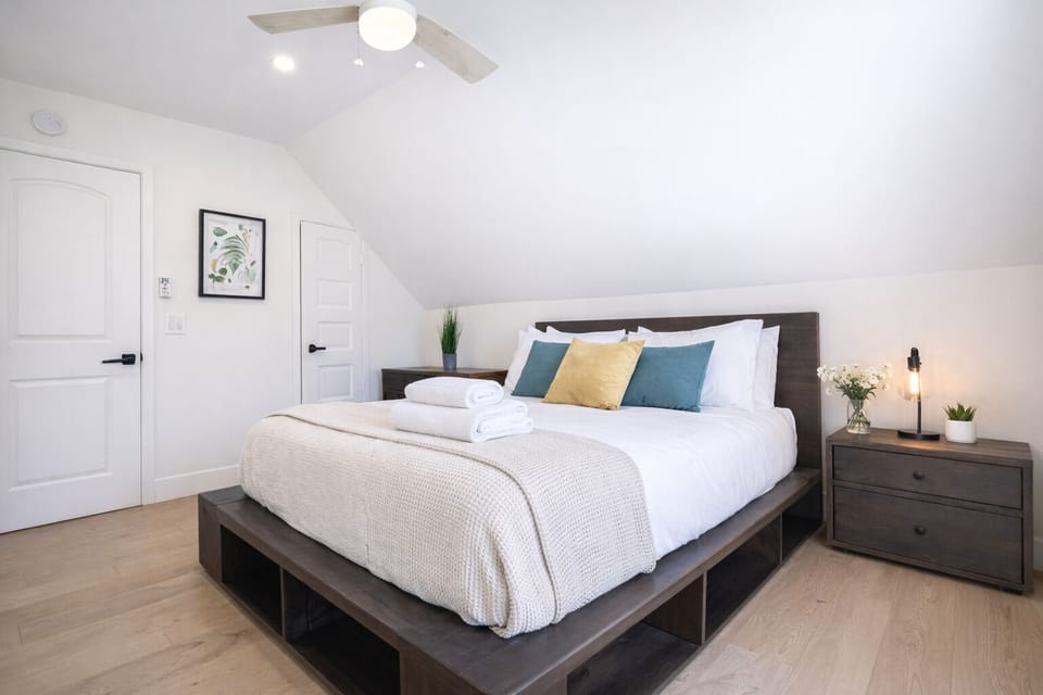 Sun-filled bedroom with calm, modern décor
