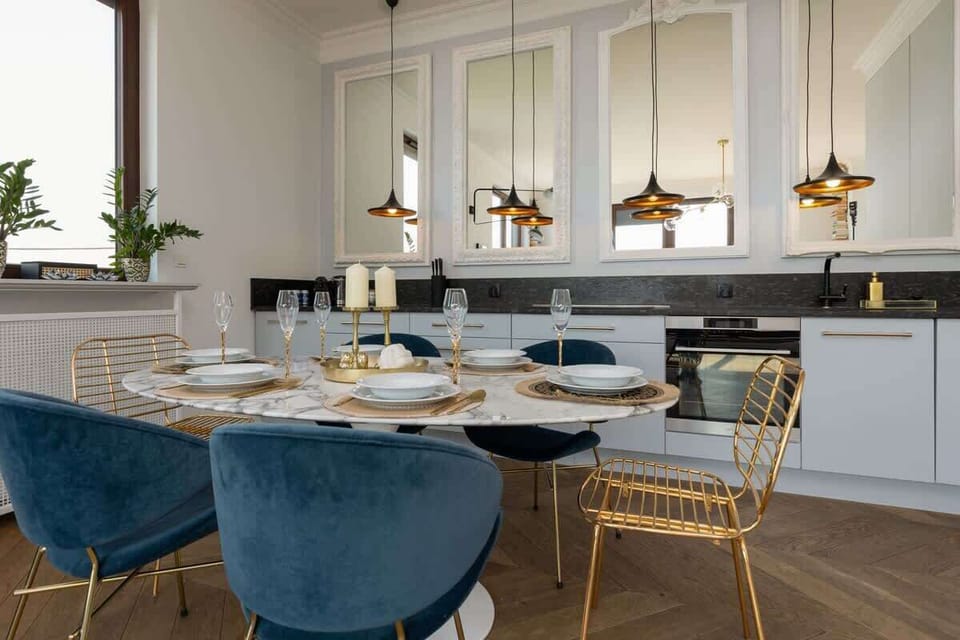 Fully equipped kitchenette with a dining area.