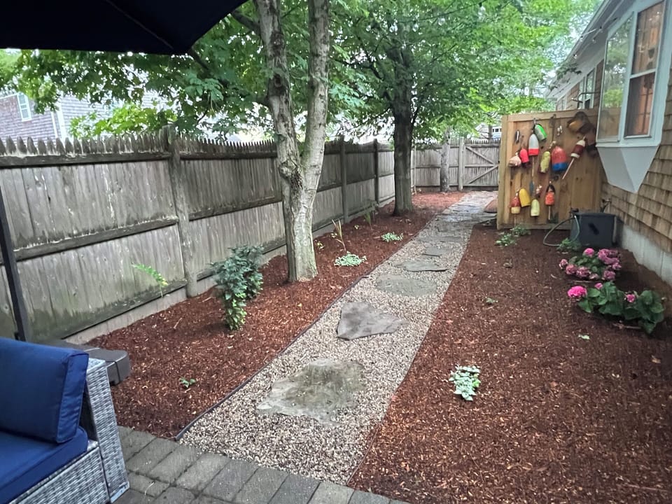 Backyard with shower and new patio seating for 6