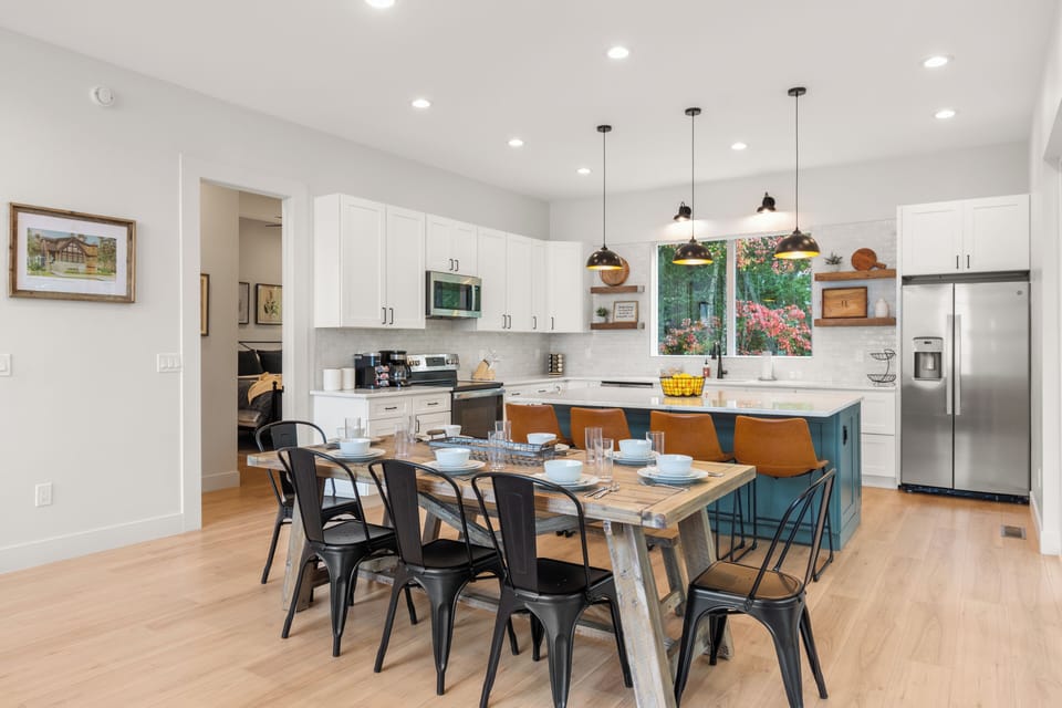Clean, bright kitchen and dining space, with room to seat 12 