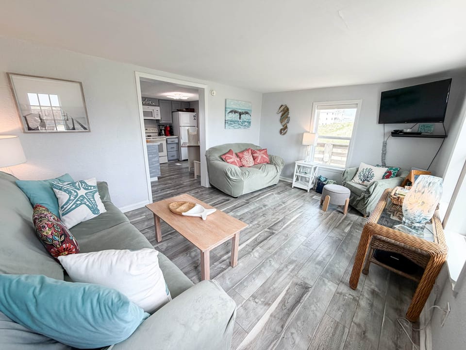 Modest living room with plenty of room for lounging.