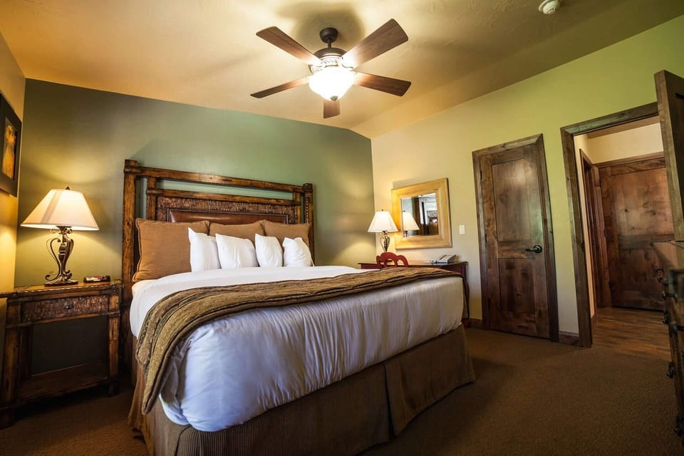Stretch out comfortably with extra space and warm bedside lighting.