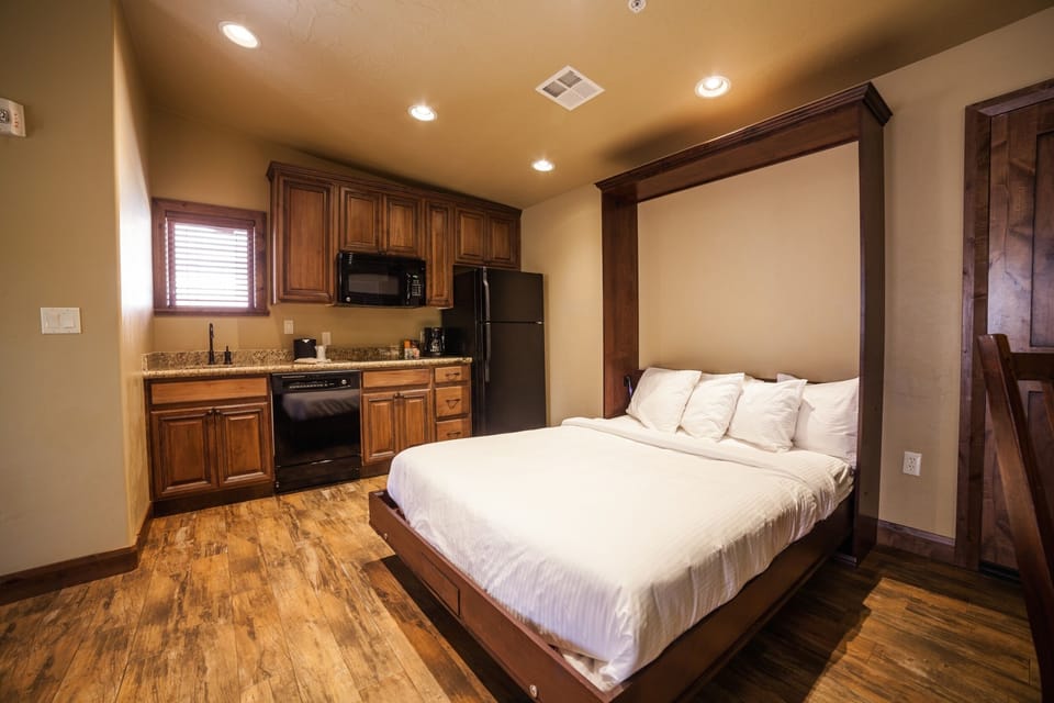 Cook light meals easily beside your comfortable pull-down bed.