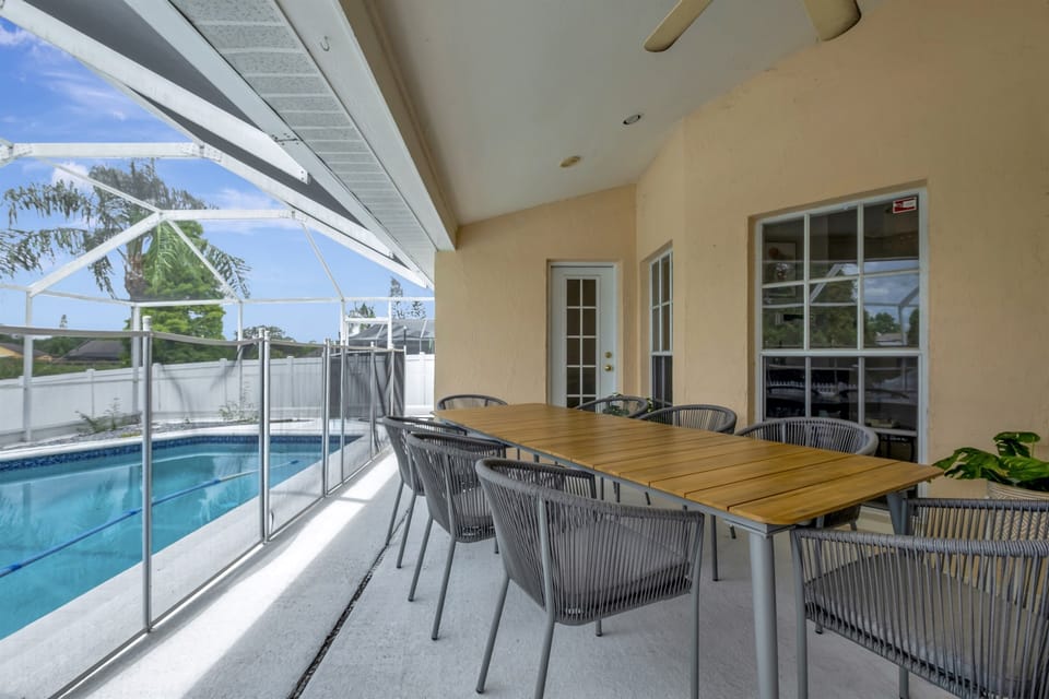 We invite you to experience the delights of our captivating outdoor common space, where the pool, comfortable seating, and lush surroundings converge to create an oasis of relaxation and fun.