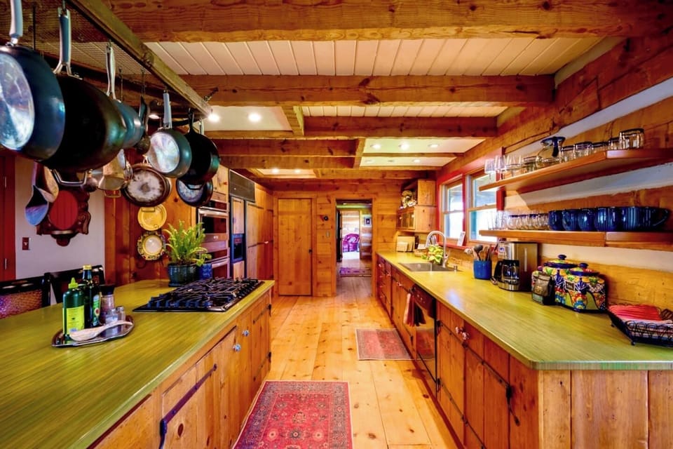 The huge chef's kitchen has tons of counter space and literally everything you need to cook for your entire party. A full service coffee/tea station (including a grinder and French press) is also available.