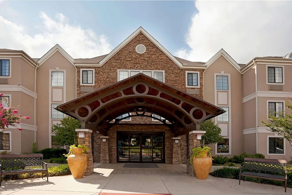 Step into a welcoming entrance framed by elegant stonework.