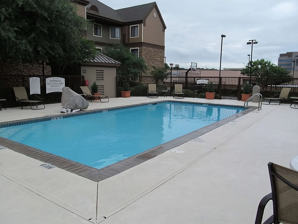 Unwind poolside with calm water and plenty of loungers.