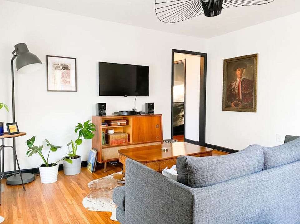 Cozy living room with a sleeper sofa, Record player, Smart TV and high-speed WiFi. Air Mattress also available.