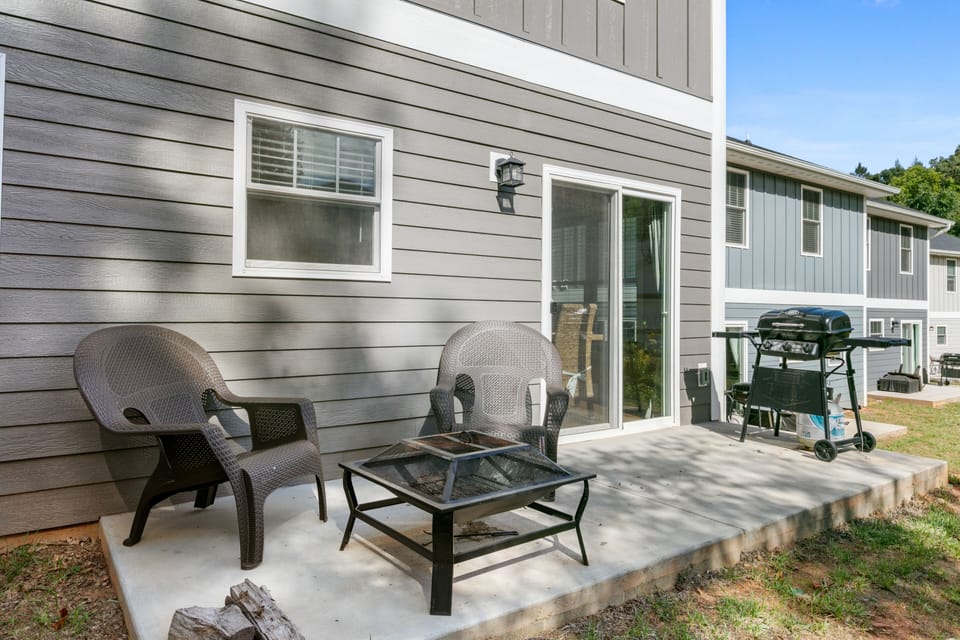Back patio with a firepit.