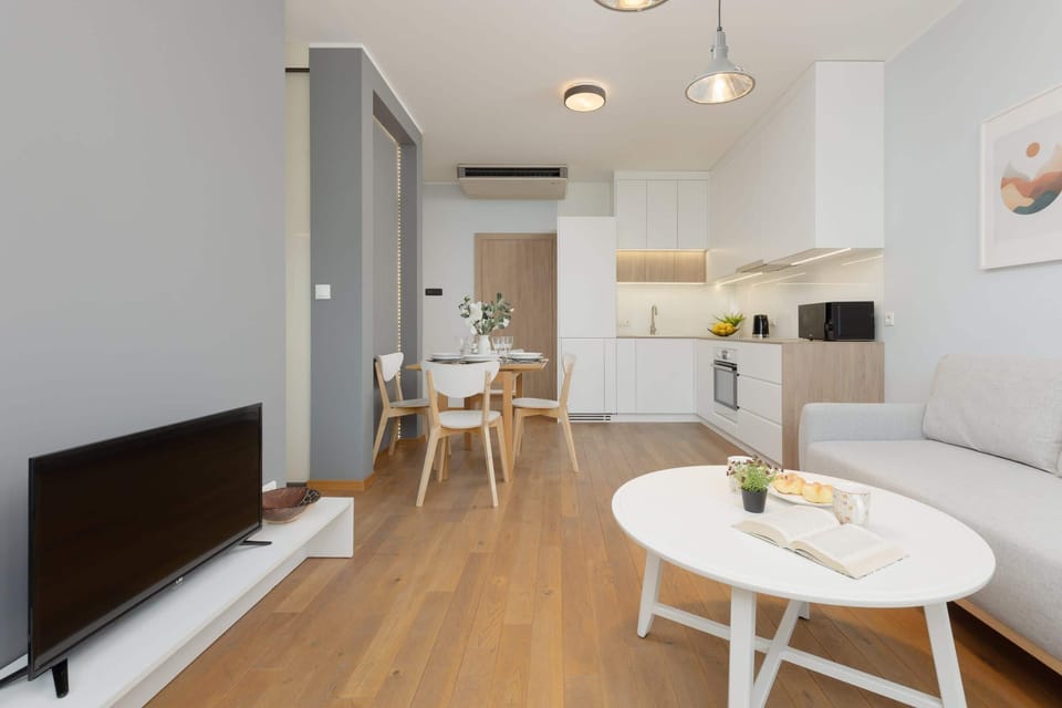 The living area's sleek design is both functional and aesthetically pleasing.