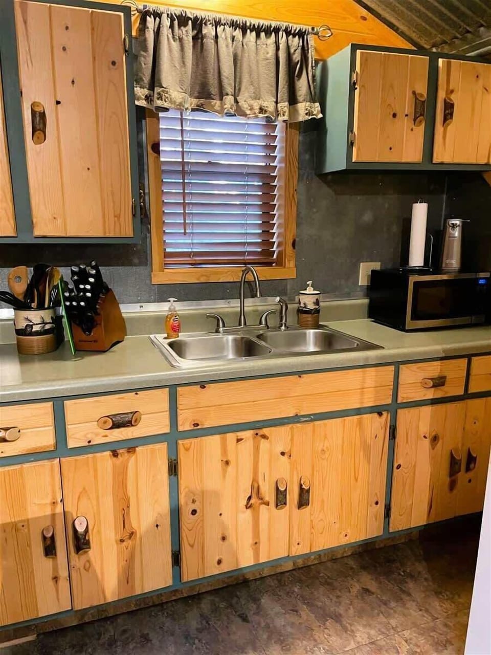 Kitchen at cozy Woods Cabin 