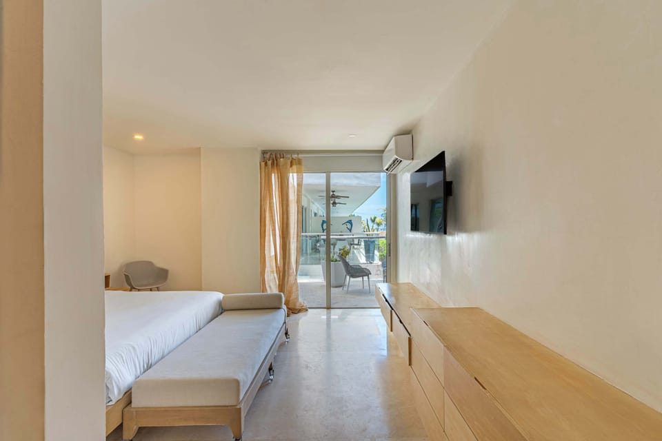 Cozy bedroom with TV