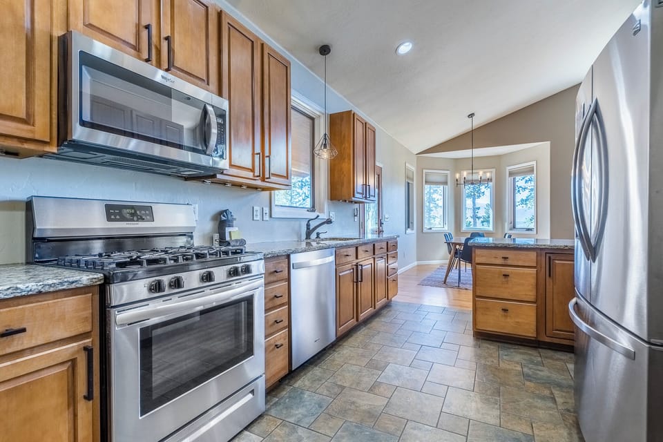 Kitchen - Kitchen with granite counter tops and stainless steel appliances