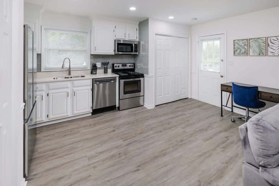 Fully equipped kitchen
with modern
appliances, cookware,
coffee maker, and
everything needed for
home cooked meals