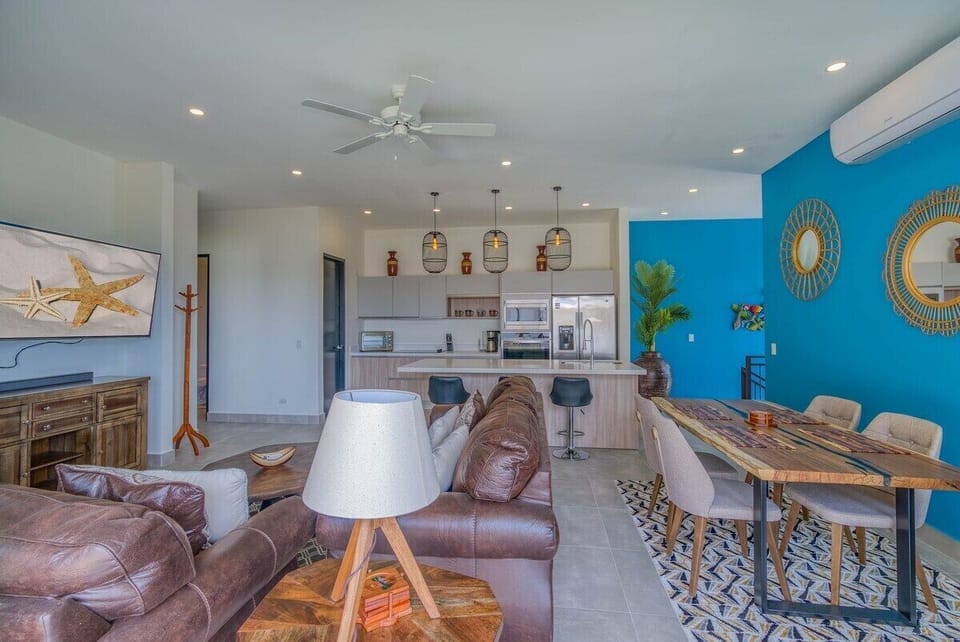 Villa Tempisque's bright and cozy living, dining and kitchen space.