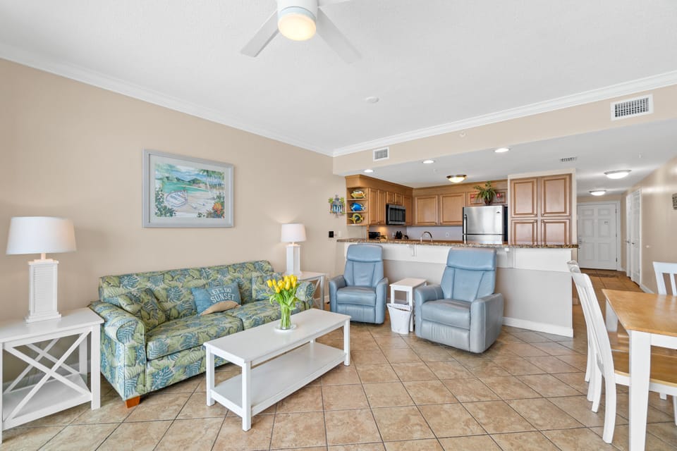 The open gathering area offers 2 comfortable leather recliners and dining.
