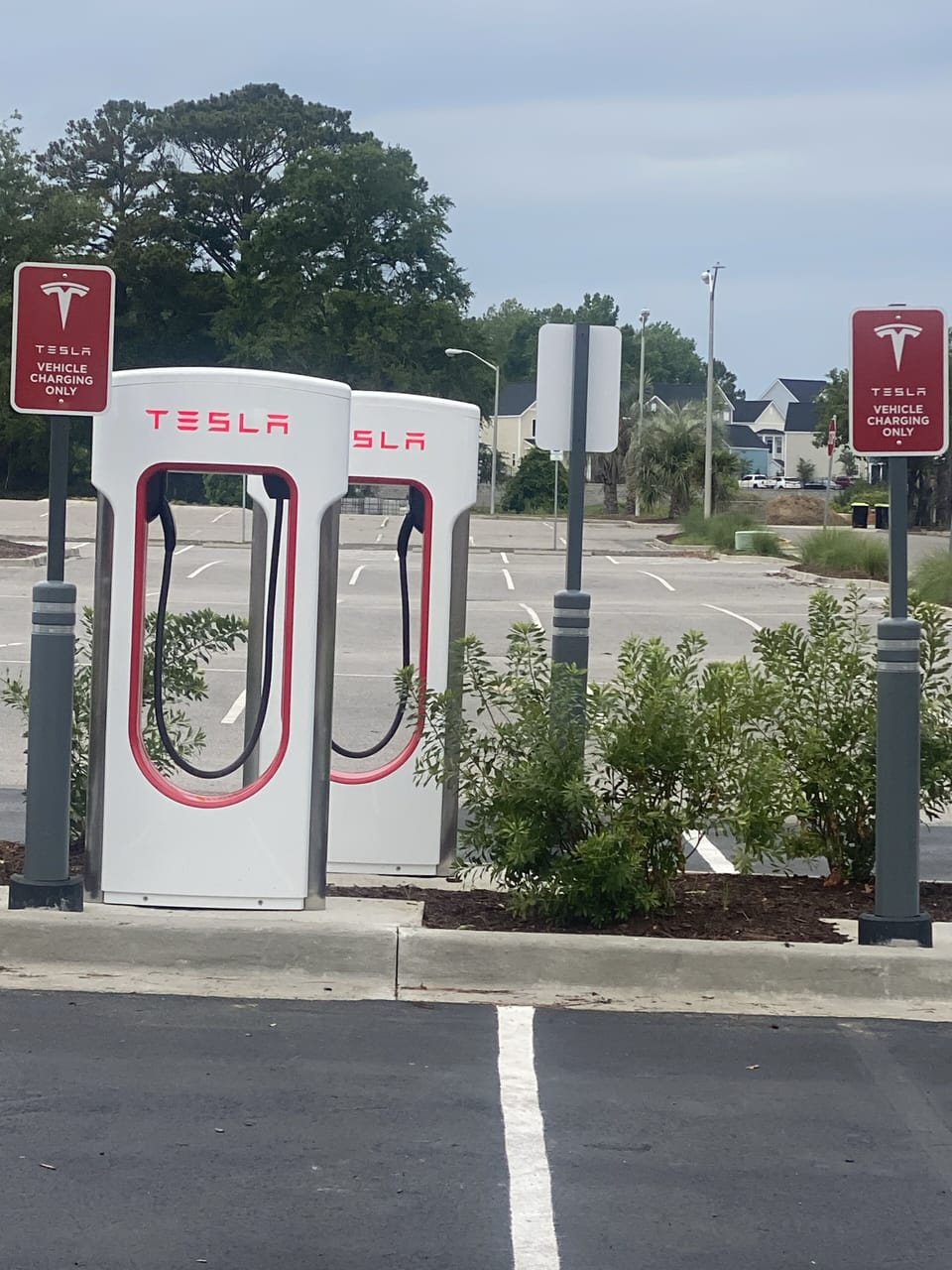 Tesla supercharger less than 1 mile away