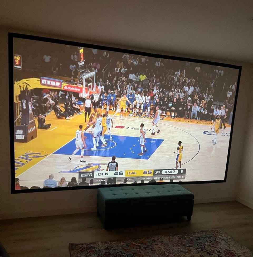 156` projector screen in the basement living room