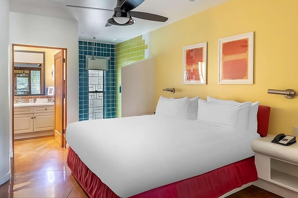 Relax in a bright king room with easy ensuite access.