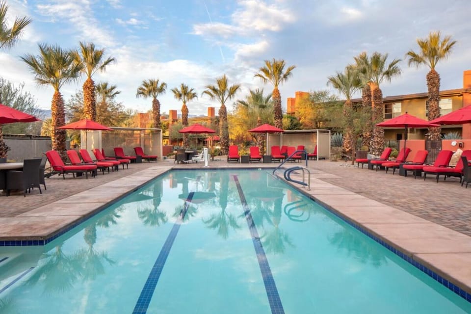 Dive into a sunlit lap swim, then lounge in style.