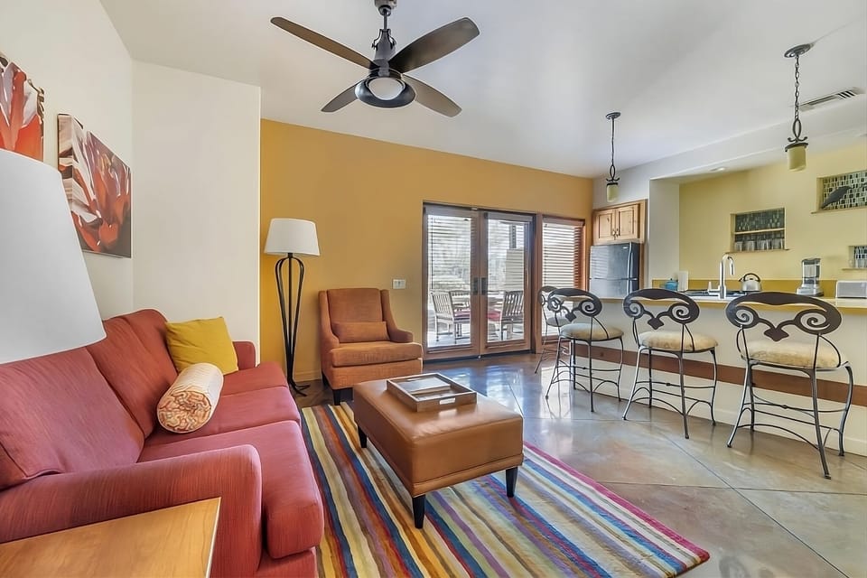 Gather on the cozy sofa, steps from the kitchen.