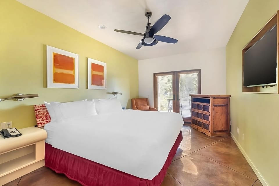 Sink into plush bedding and enjoy serene morning light.
