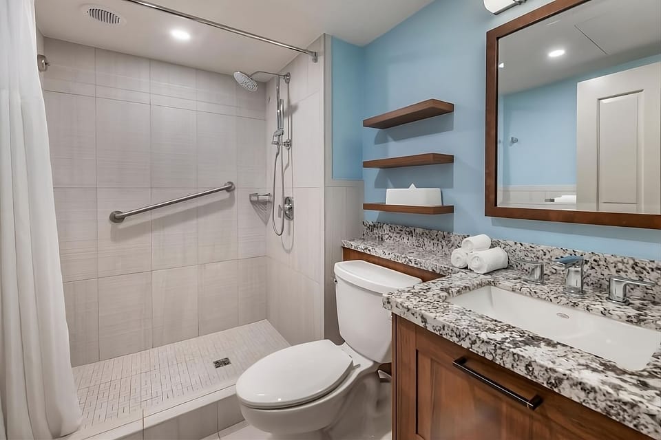 Refresh in a bright walk-in shower with sleek finishes.
