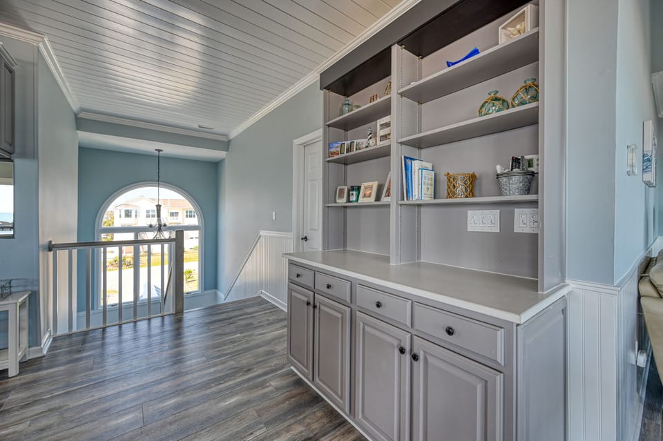 Cabinets stocked with games to keep your family busy even on rainy days. 