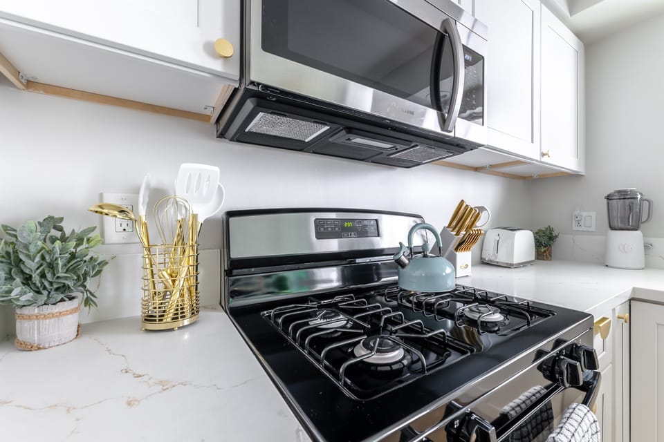 Kitchen utensils and a hot water kettle