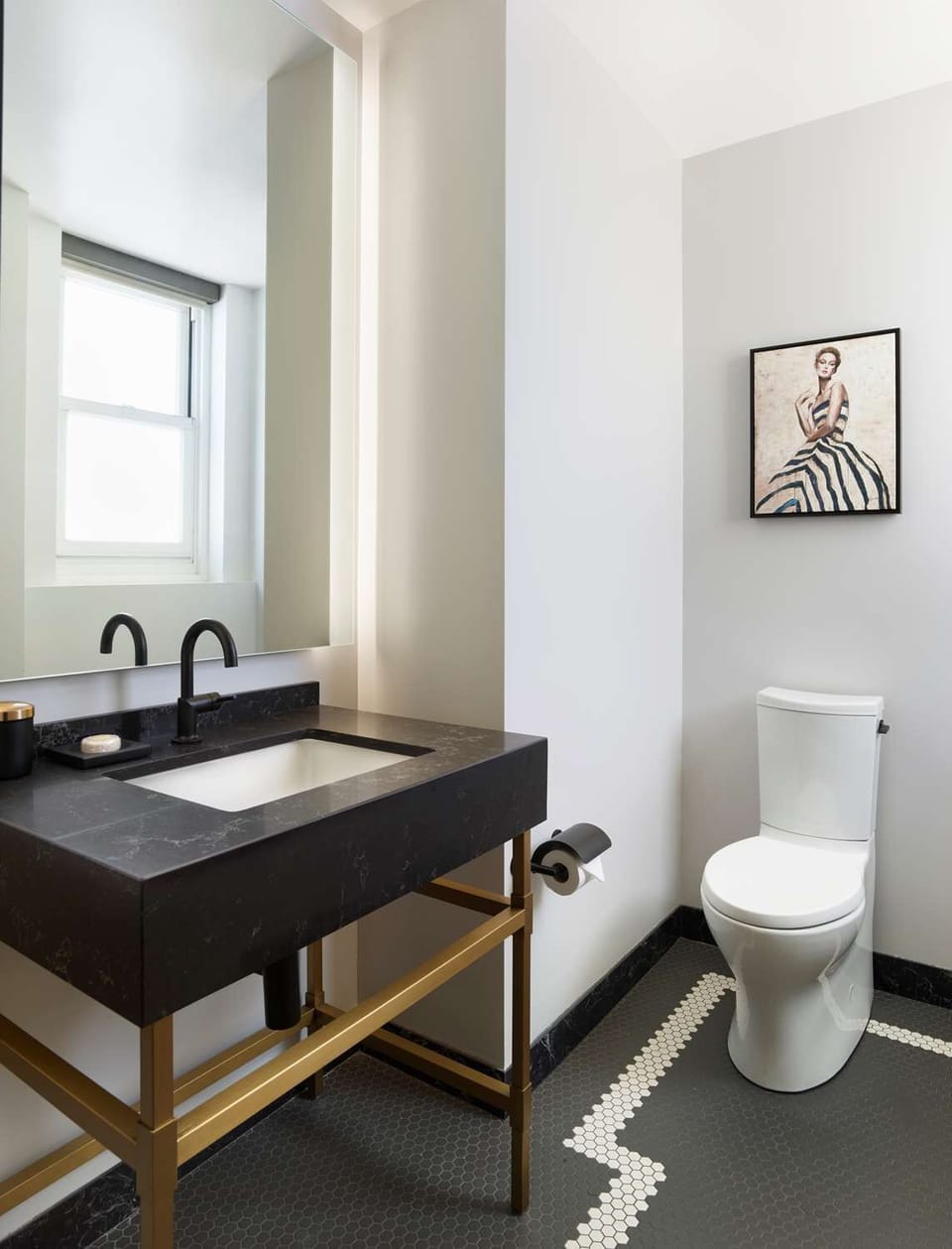 Start mornings at a designer vanity with soft natural light.