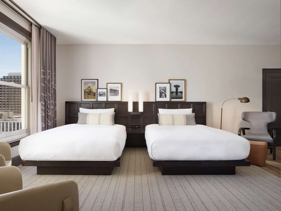 Sprawl out with friends in a sunlit room made for rest.