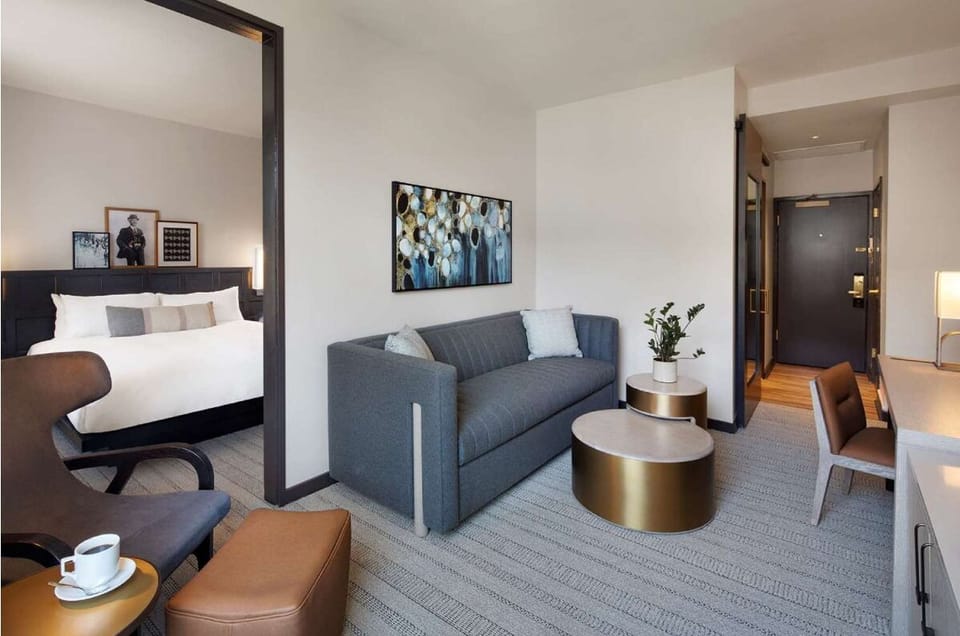 Sip morning coffee while your suite flows bedroom to lounge.