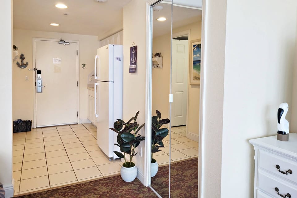 Mirror closet doors for full viewing of yourself before heading out.