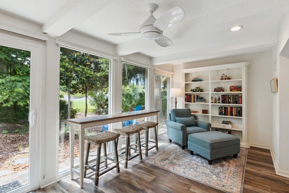 Extended Living Area with Barstool Seating, Reading Nook and Desk