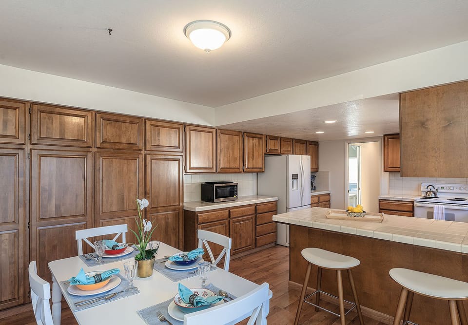 Dining Table Seats 4 Plus 2 More at the Kitchen Counter