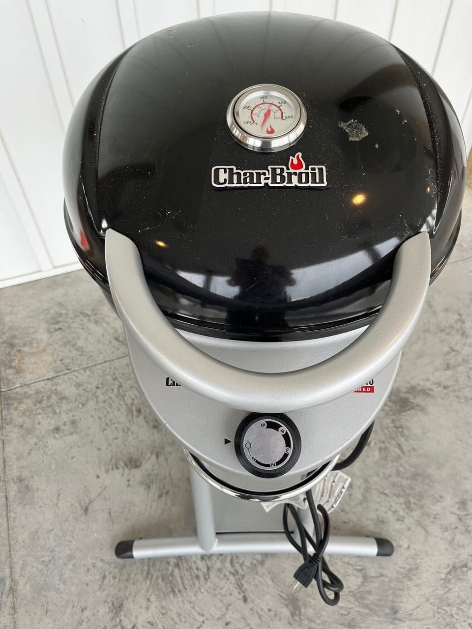 Electric grill on deck close to the kitchen for easy grilling.