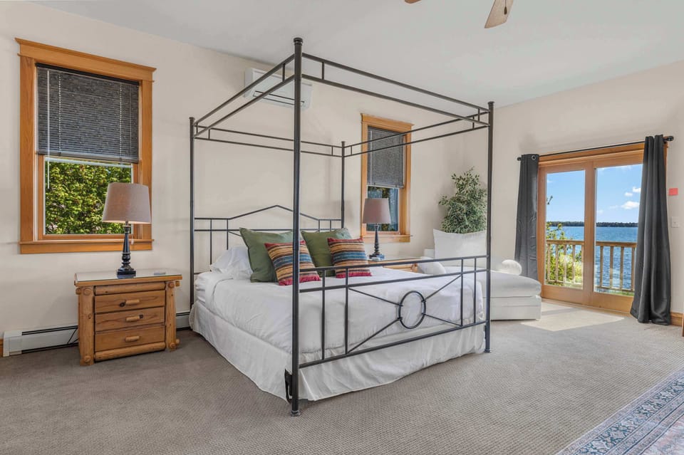 Suite 1 includes a king size bed with waterside deck