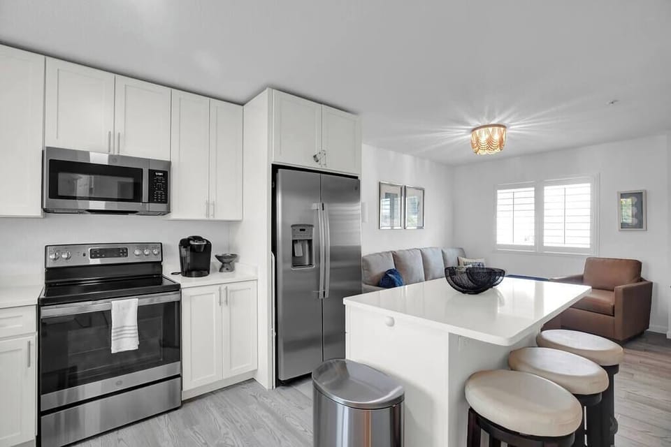 Large Kitchen Island with seating for 4; Stainless steel appliances; Keurig coffee maker