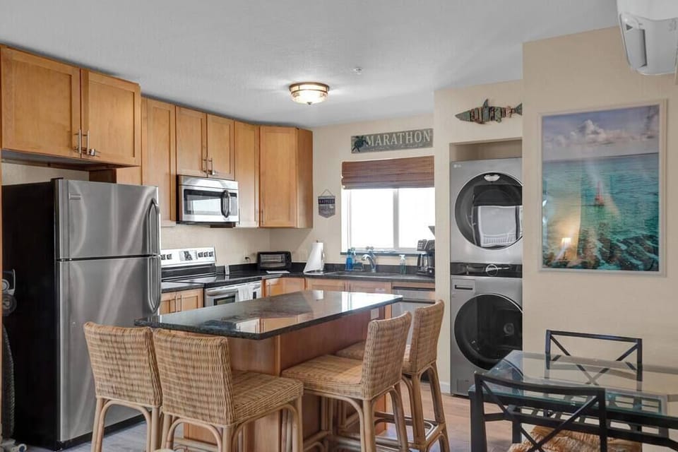 Full Kitchen with Large Kitchen Island, 4 bar seats; Dining Table for 2