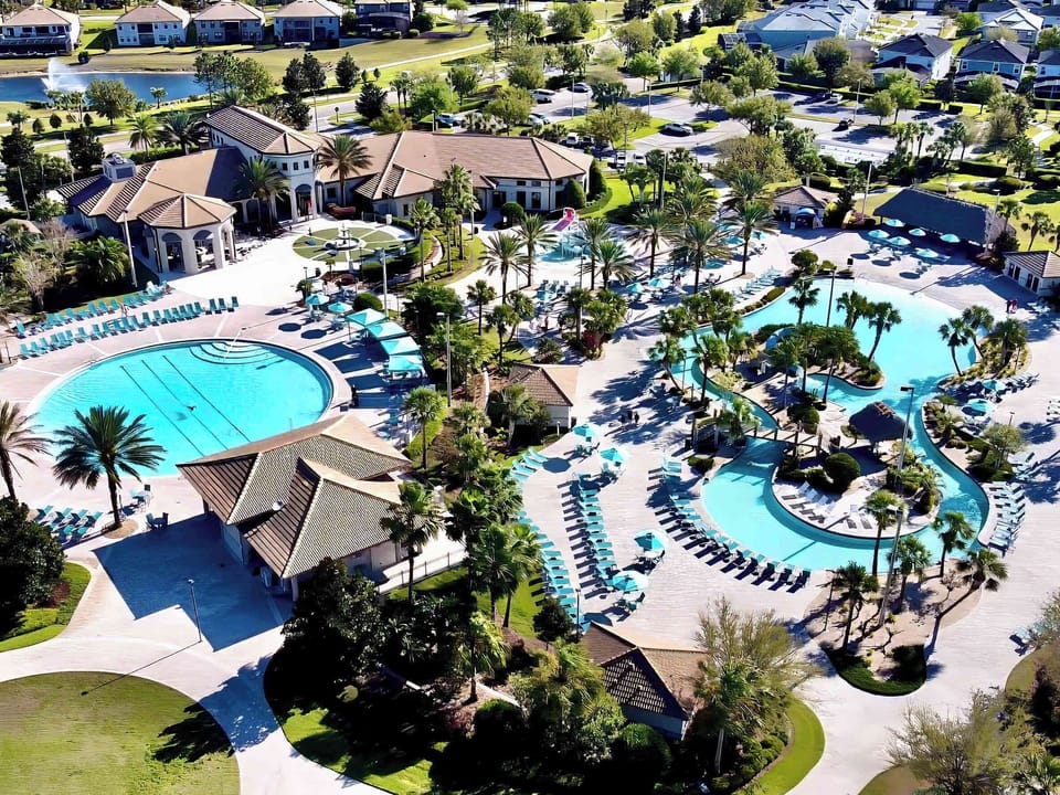 Escape to the tropical resort complex featuring a sparkling resort-style pool, relaxing lazy river, thrilling waterslide, bubbling jacuzzi, and an exciting water playground with splash pad.