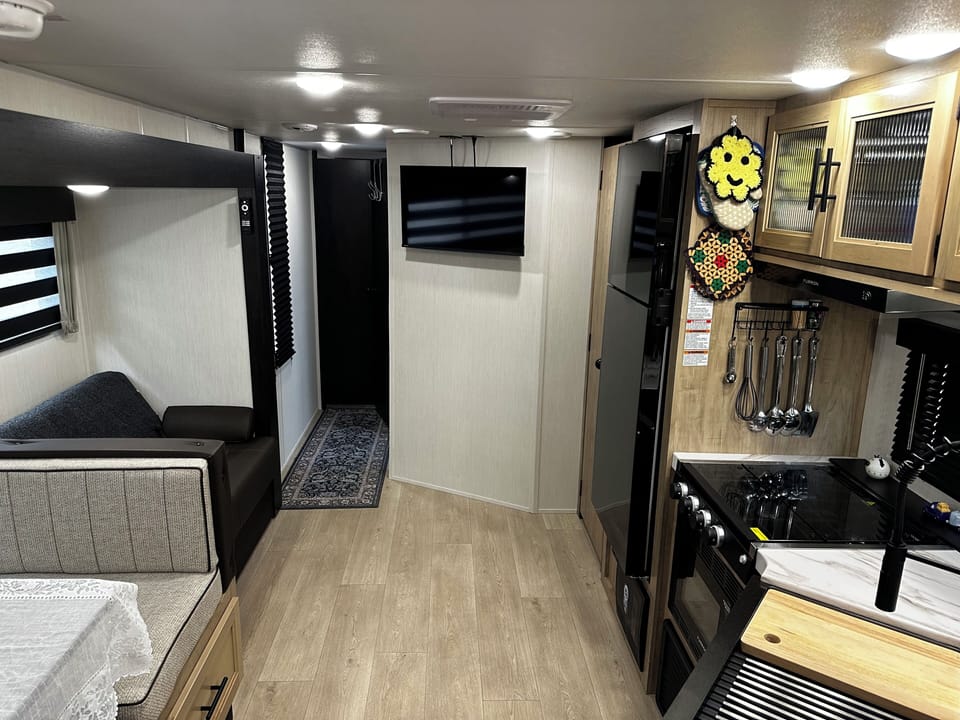Roomy common space and extra sleeping areas.