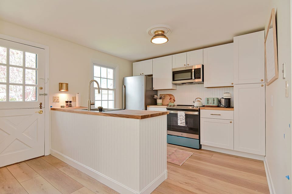 The galley kitchen is well-equipped.