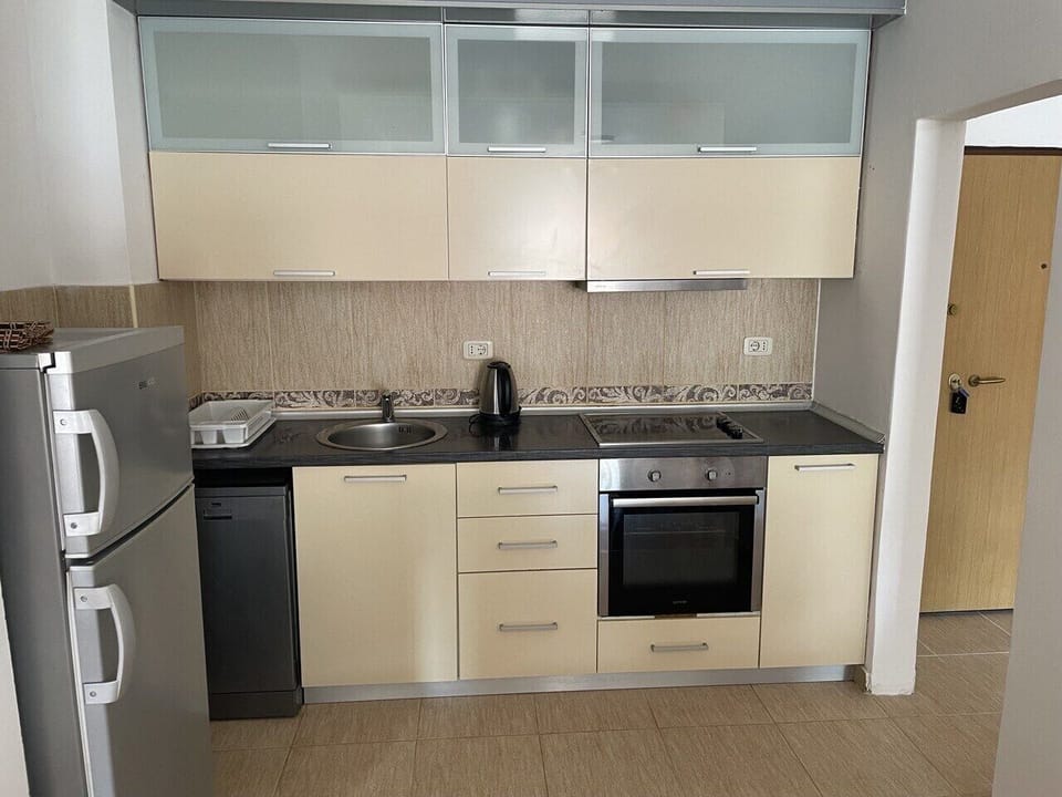 Stove, oven, fridge and kitchenware you can always find in our kitchen