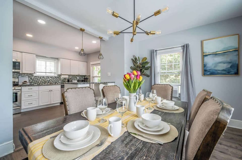 Beautifully decorated open concept dining room. Lots of natural light