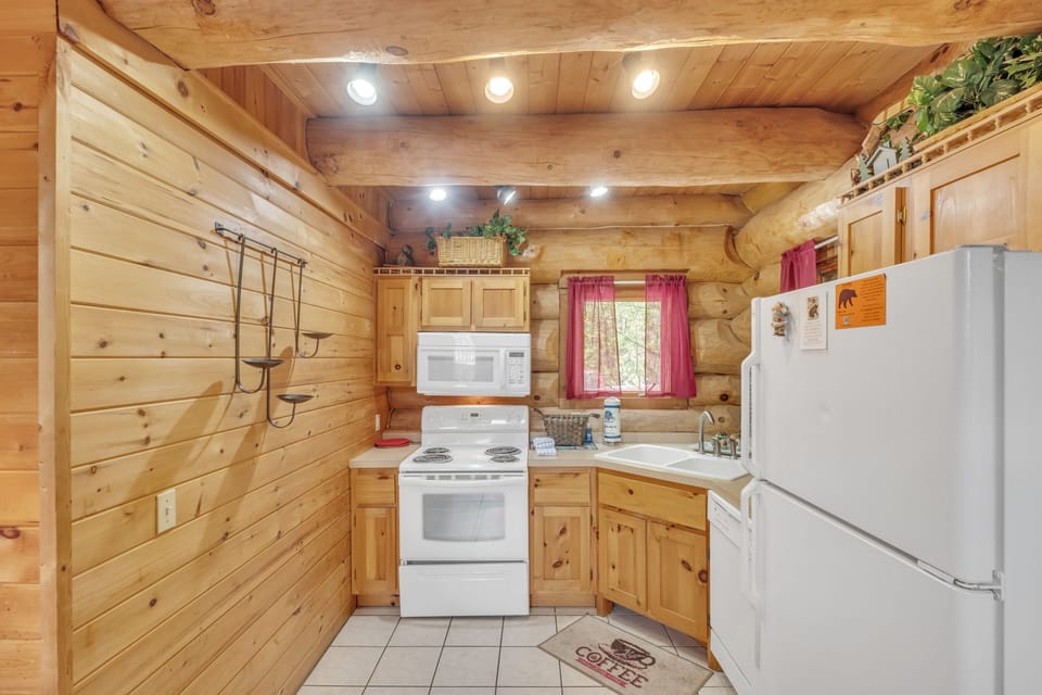 Indoors, Hardwood, Refrigerator, Rug, Stained Wood