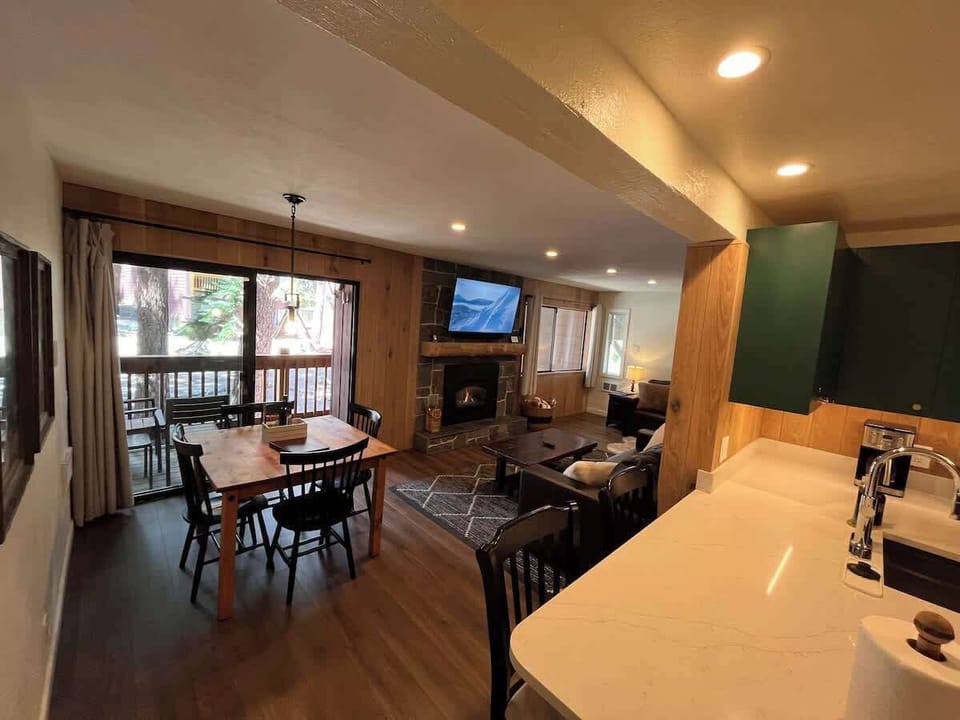 Dining table and breakfast bar.  Total seating for 6 people.
