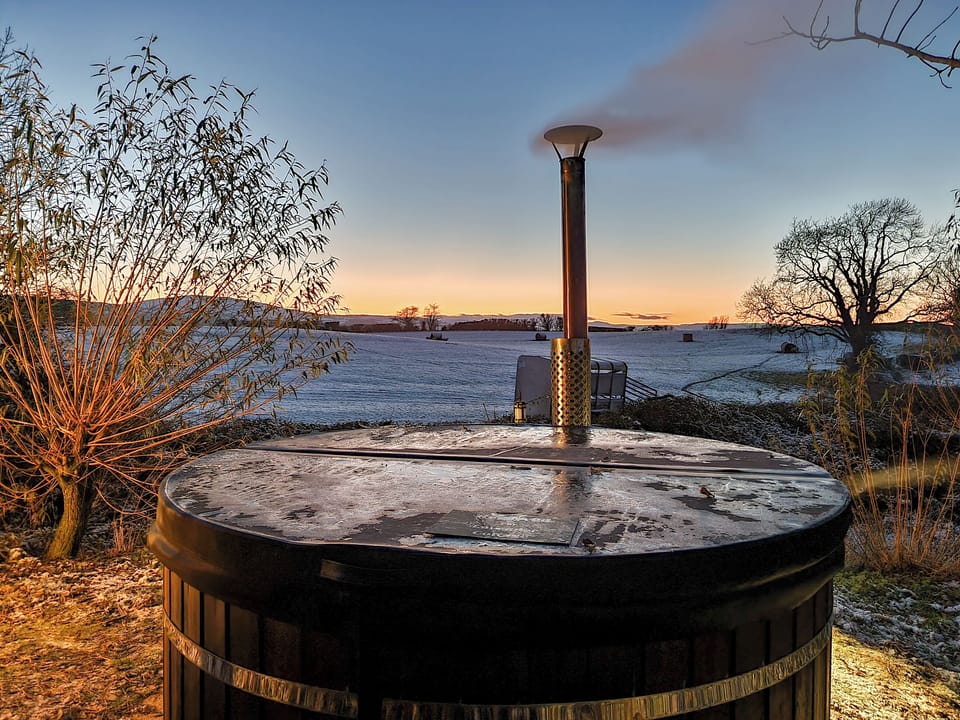 Hot tub with a view | Pen y Bryn Farm and Holiday Cottages, Betws Yn Rhos