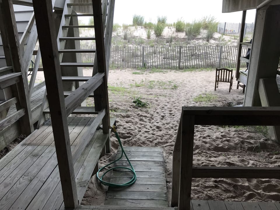 Lower deck with direct beach access and outside shower
